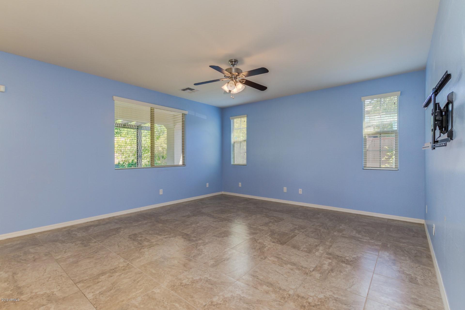 20876 West Stone Hill Road Buckeye, AZ 85396 - Photo 12 of 34 Family Room