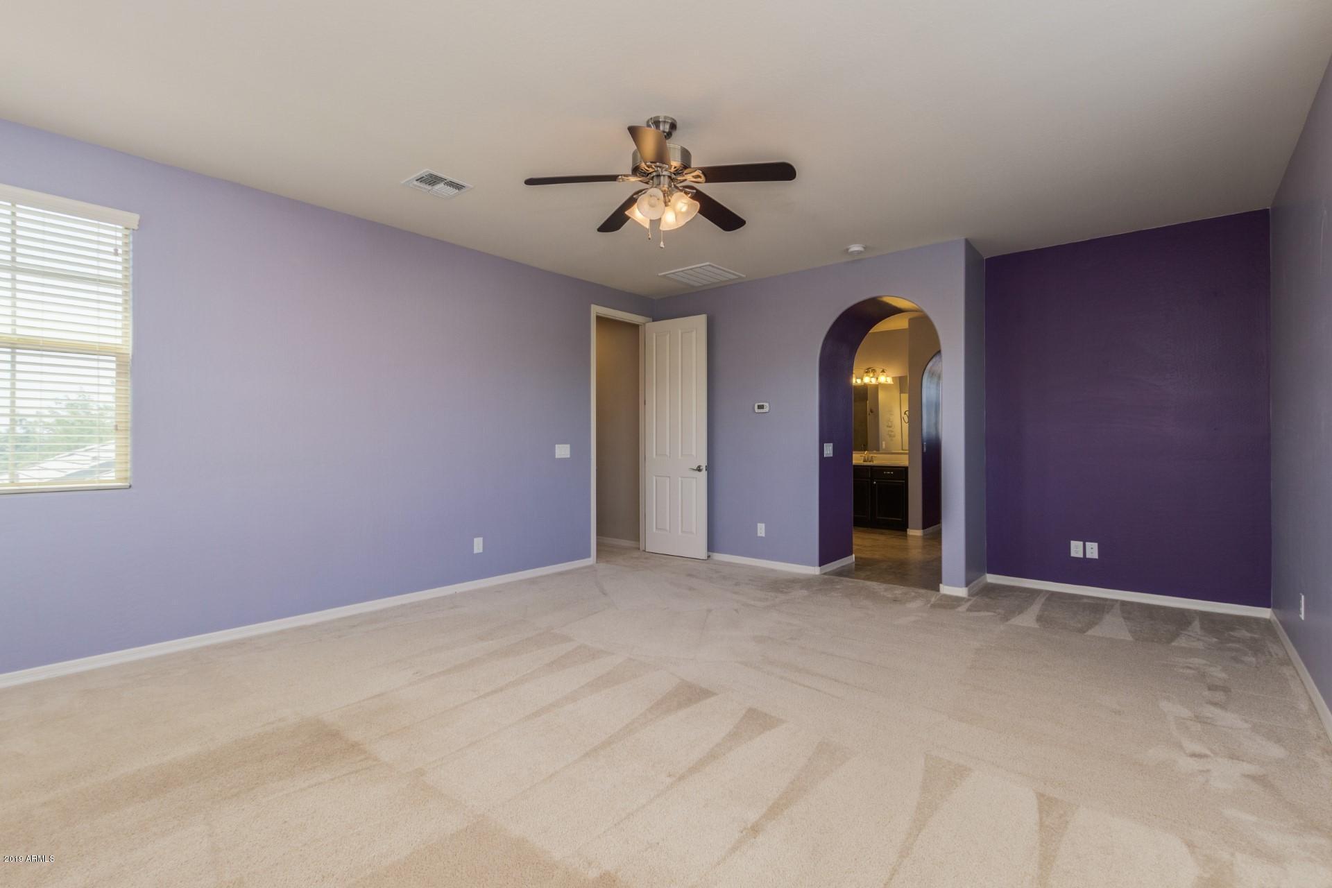 20876 West Stone Hill Road Buckeye, AZ 85396 - Photo 16 of 34 Master bedroom