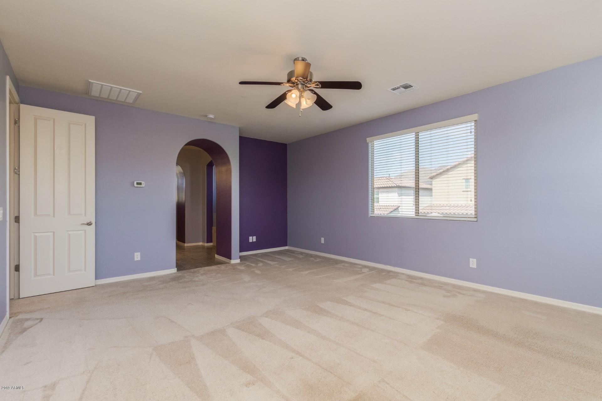 20876 West Stone Hill Road Buckeye, AZ 85396 - Photo 17 of 34 Master bedroom