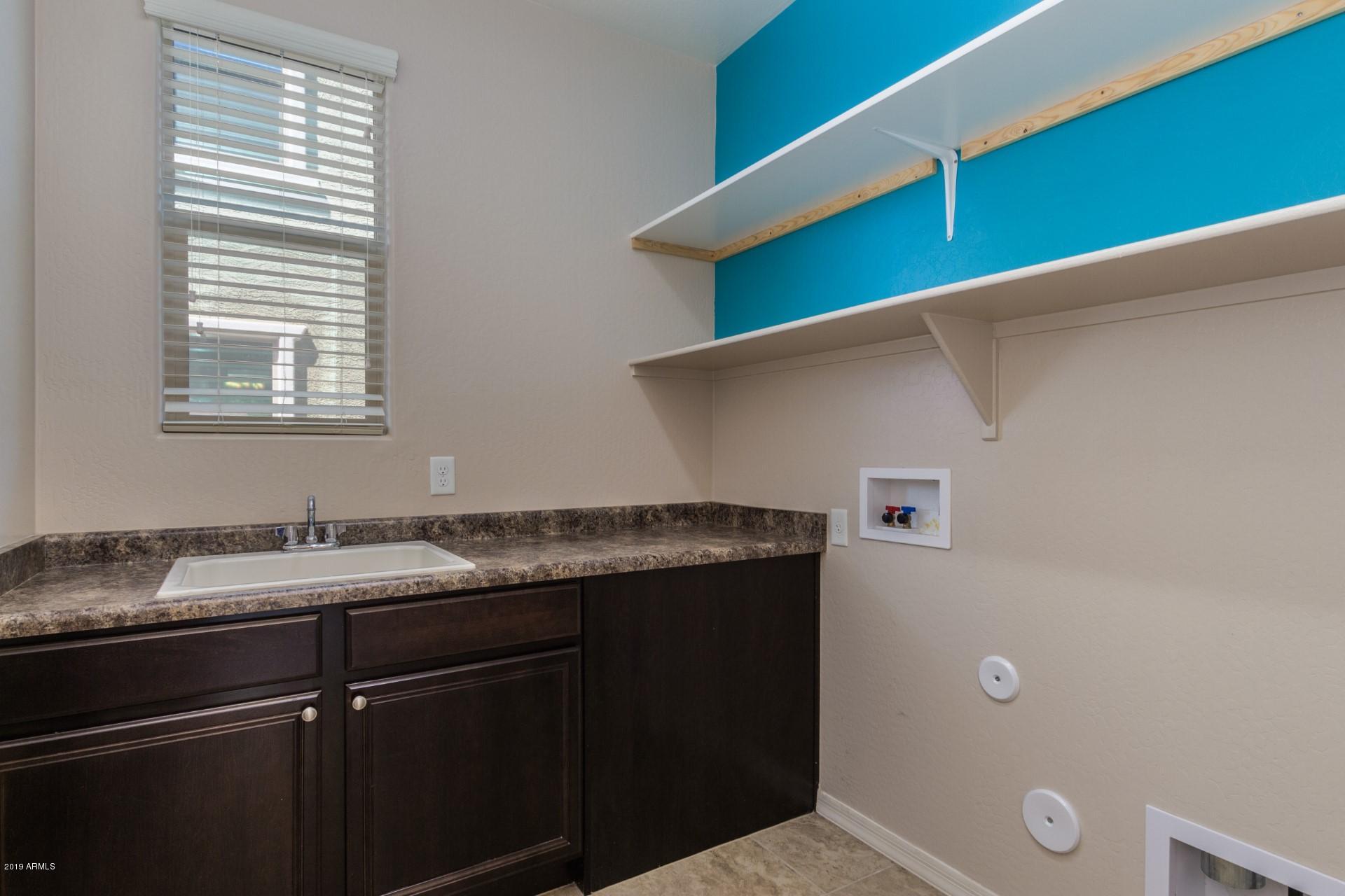 20876 West Stone Hill Road Buckeye, AZ 85396 - Photo 29 of 34 Laundry room