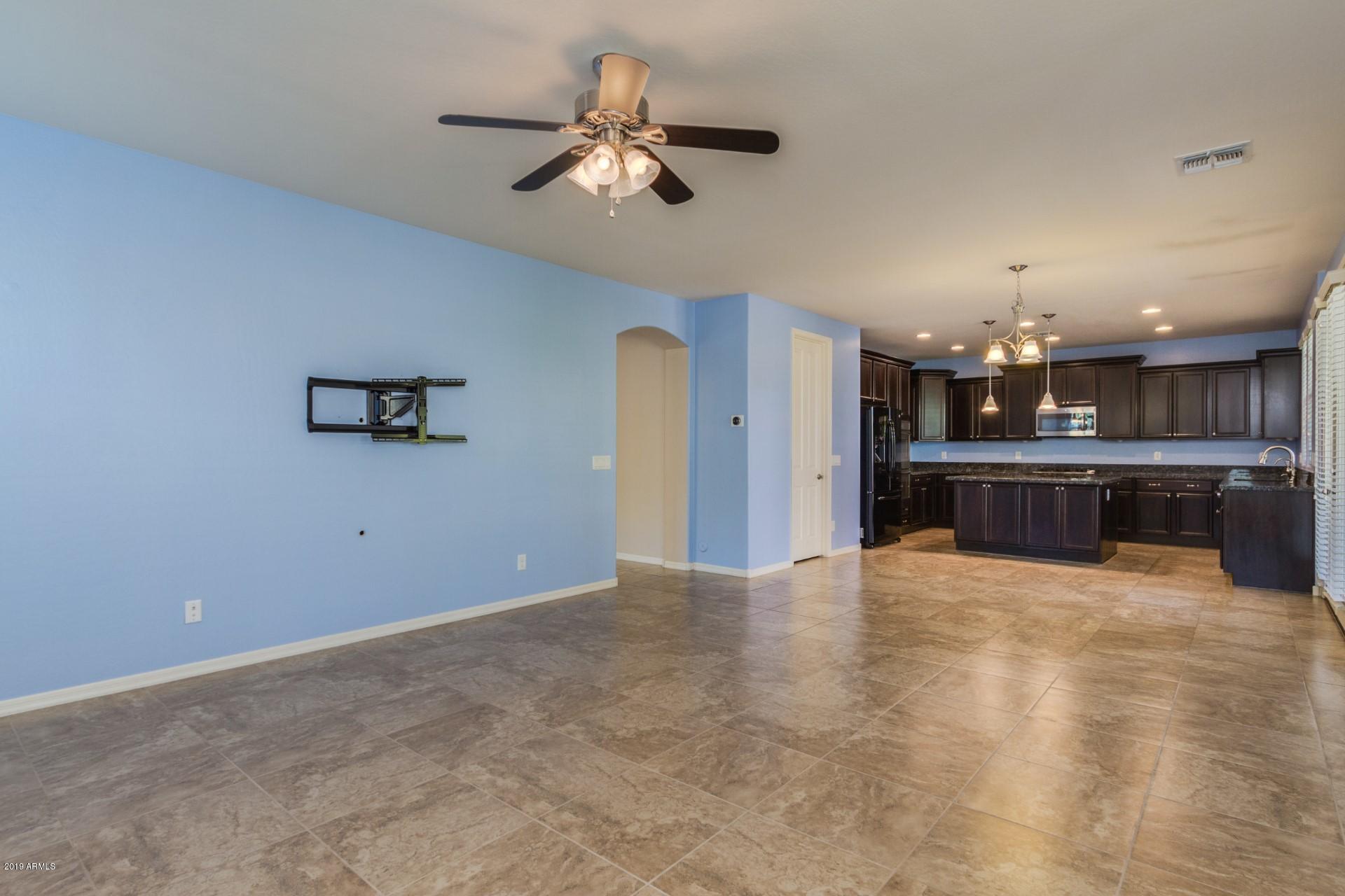 20876 West Stone Hill Road Buckeye, AZ 85396 - Photo 6 of 34 family room