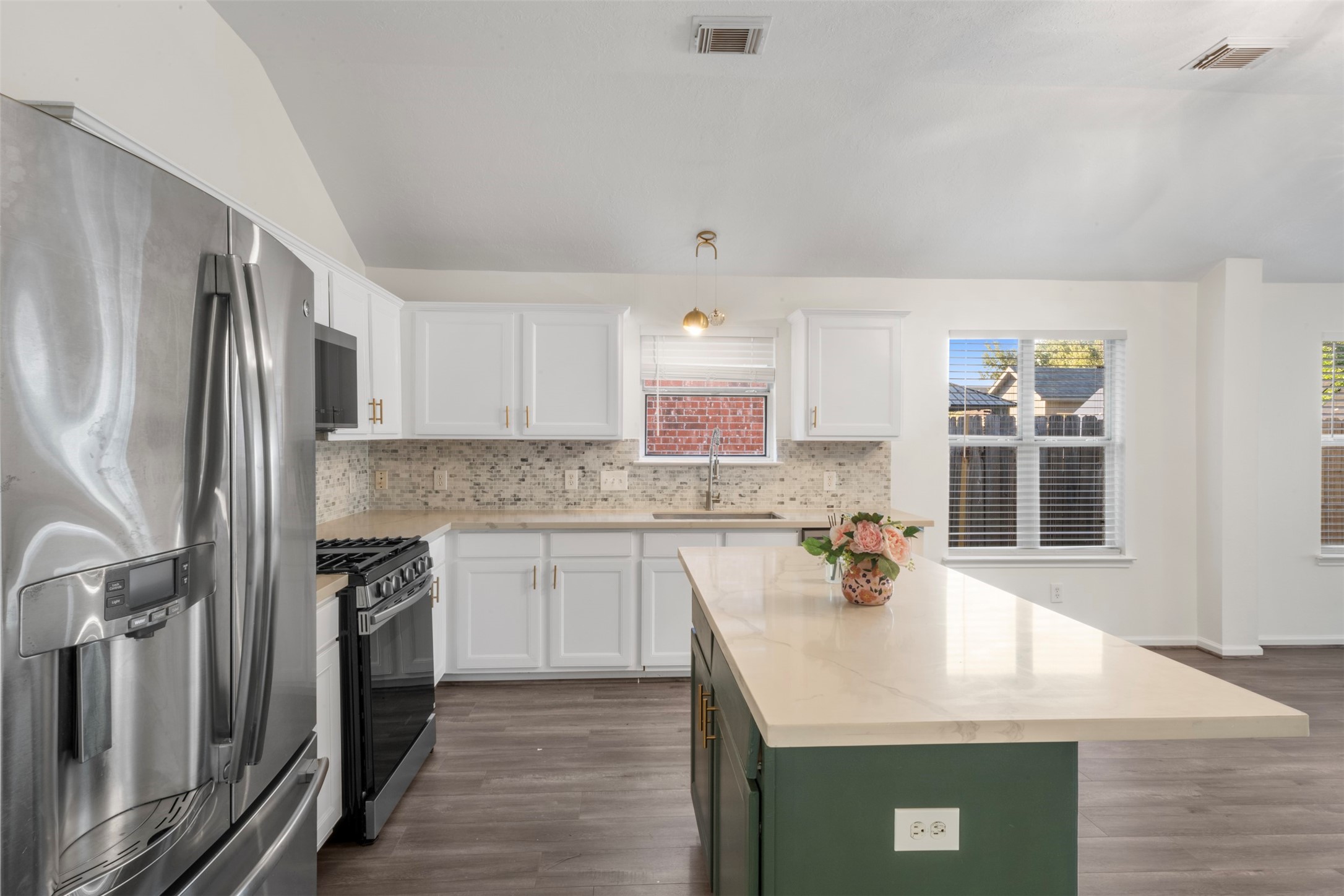 3507 Palomar Valley Drive Spring, TX 77386 - Photo 10 of 22 a kitchen with stainless steel appliances granite countertop a sink stove and refrigerator