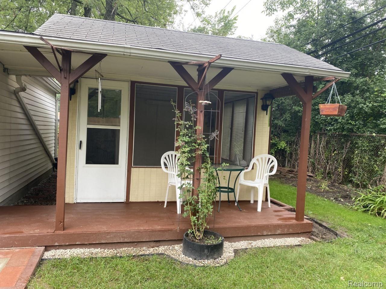 3016 Harvard Road Royal Oak, MI 48073 - Photo 17 of 19 Backyard oasis with covered porch and separate screened in area and storage space too!