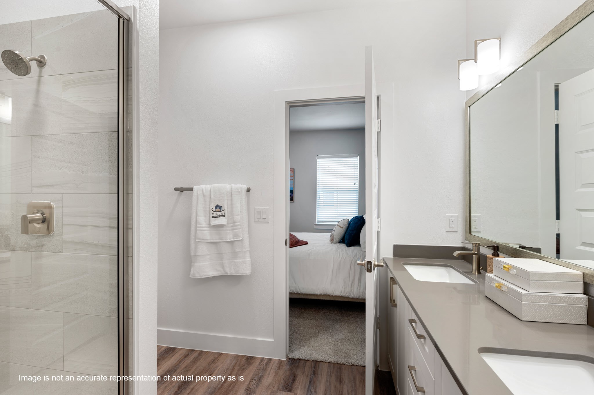 28328-427 Birnham Woods Drive Spring, TX 77386 - Photo 17 of 37 a en suite bathroom with a double vanity sink a mirror and shower