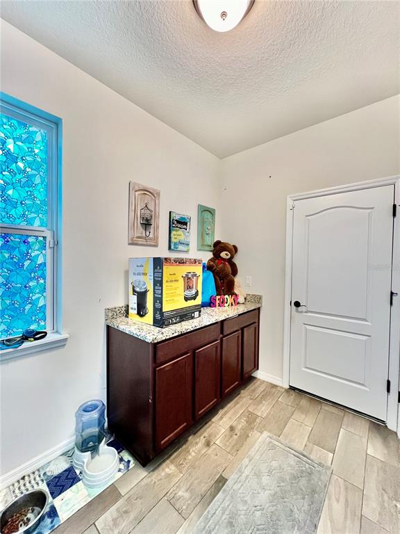 14112 Poke Ridge Drive Riverview, FL 33579 - Photo 12 of 46 a room with furniture and window