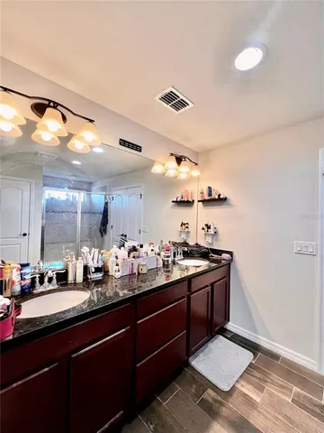 a kitchen with a sink and stove