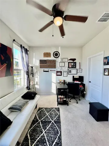 a bed room with a bed and a piano