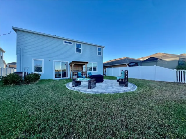 a view of house with outdoor space and porch