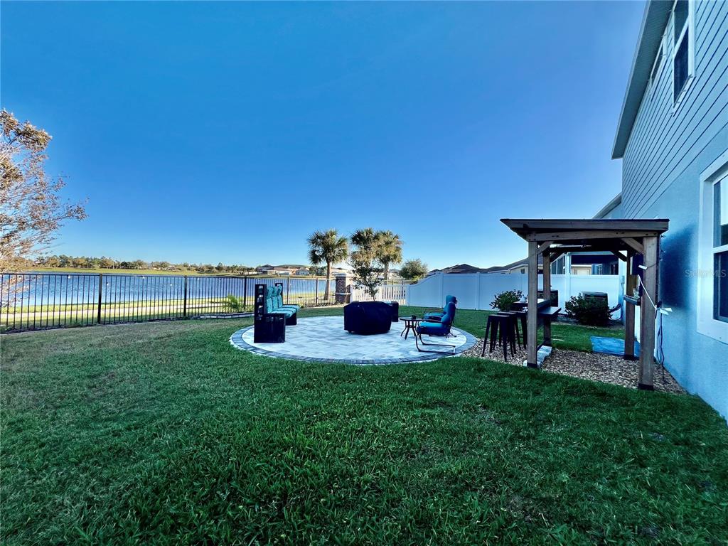 14112 Poke Ridge Drive Riverview, FL 33579 - Photo 40 of 46 a view of a house with backyard porch and sitting area