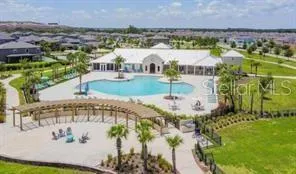 a view of a swimming pool from a lounge chair