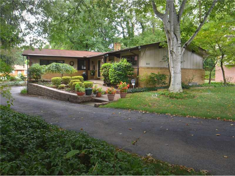 Exterior Front. Unique 3 BR ranch with an open floor plan.  Updated Kitchen. Beautiful hardwood floors.  Home can be access from front and back on roads.  Finished large game room.  Must see.