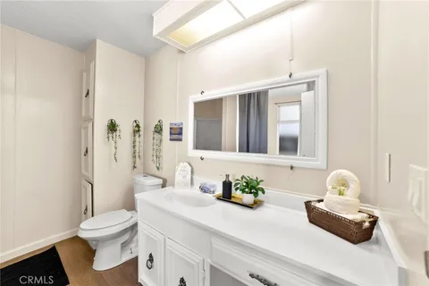 a en suite bathroom with a bathtub and mirror