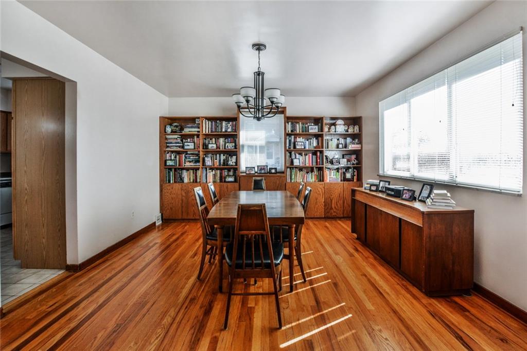 The dining room is large and bright and features lovely built-ins!