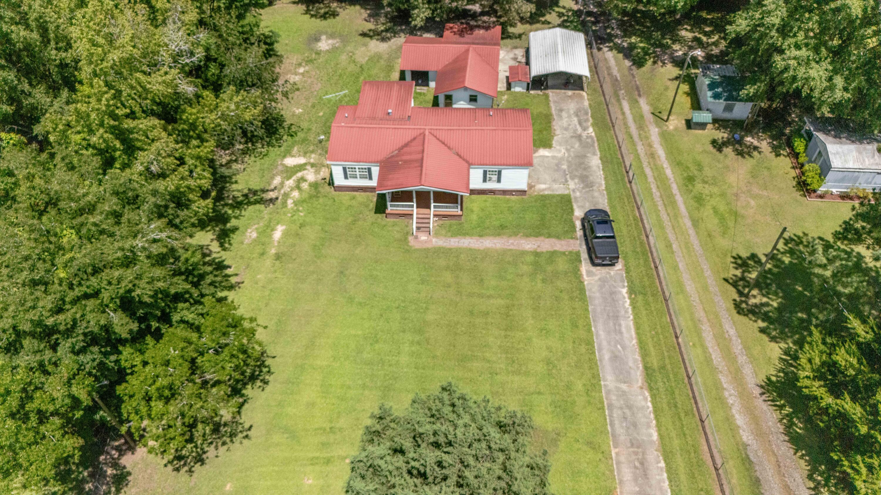 4341 Nelson's Ferry Road Summerton, SC 29148 - Photo 3 of 26 DJI_20250616141421_0013_D