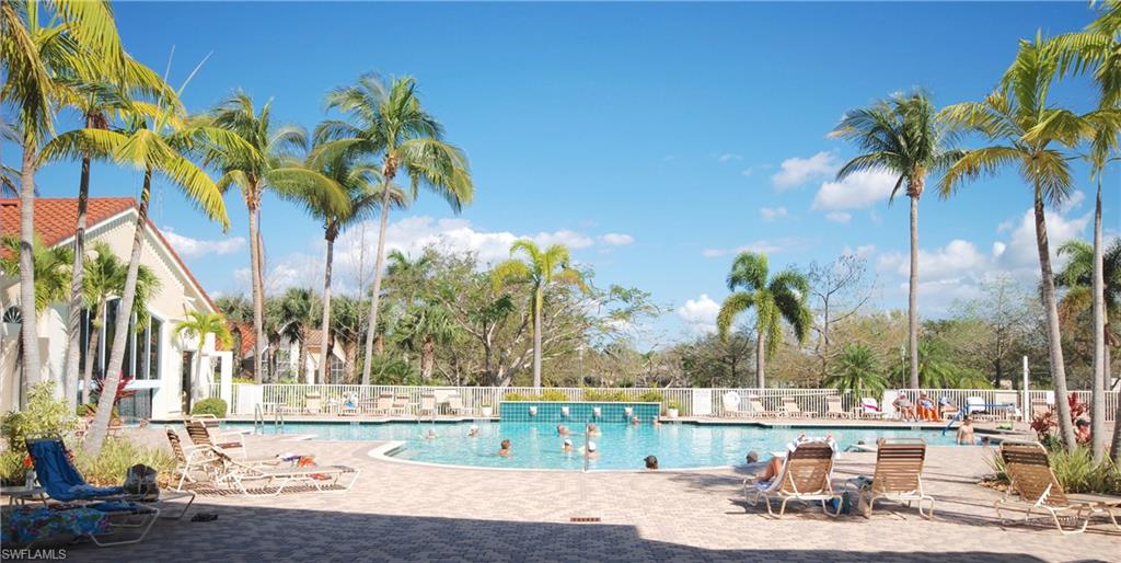 9200 Springview Loop Estero, FL 33928 - Photo 17 of 25 a view of a swimming pool and a chair