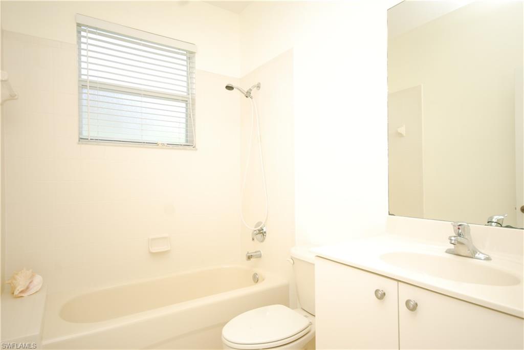 9200 Springview Loop Estero, FL 33928 - Photo 9 of 25 a bathroom with a sink toilet and shower