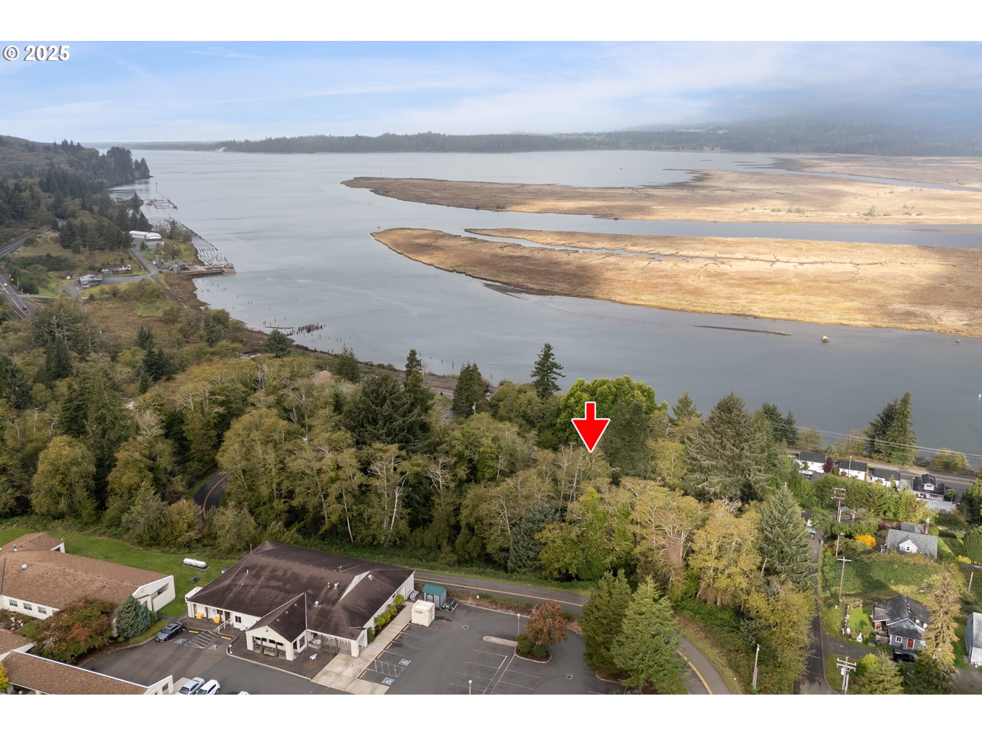 Rowe Street, Unit 1800 Wheeler, OR 97147 - Photo 8 of 11 a view of lake from a yard