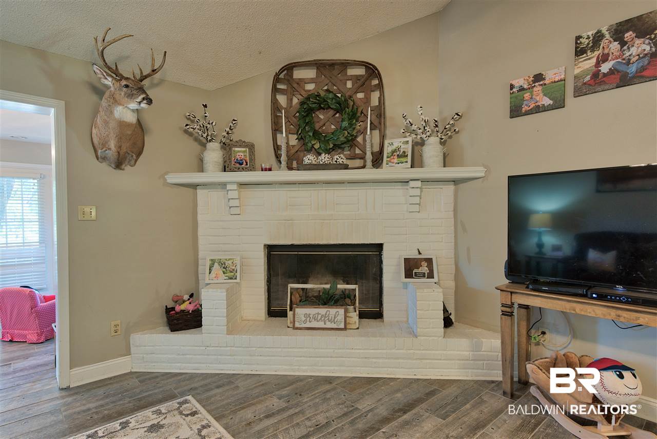 22201 Price Grubbs Road Robertsdale, AL 36567 - Photo 12 of 43 Wood Burning Fireplace
