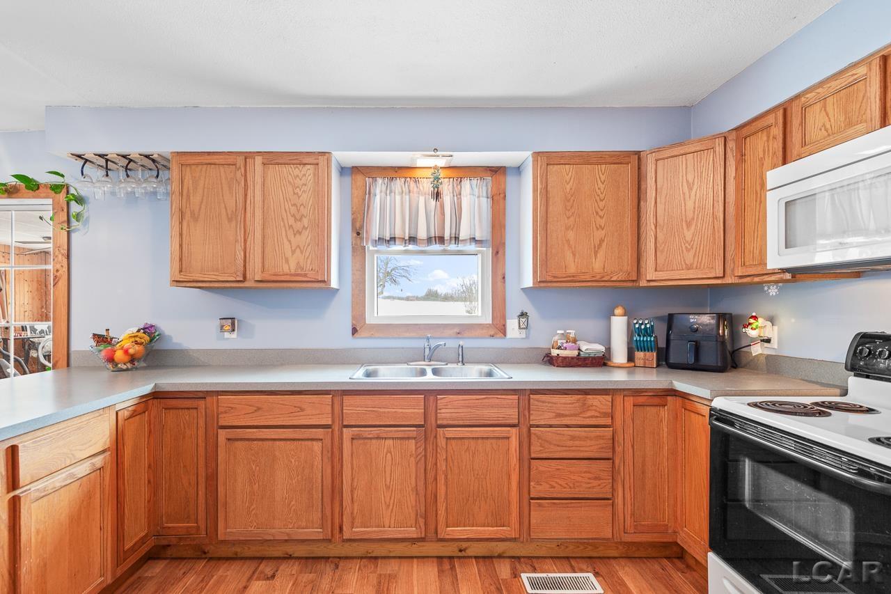 13570 Plank Road Clayton, MI 49235 - Photo 10 of 35 50132034-512be686-2b90-4ea0-85f3-884f3d7e20e0.JPG