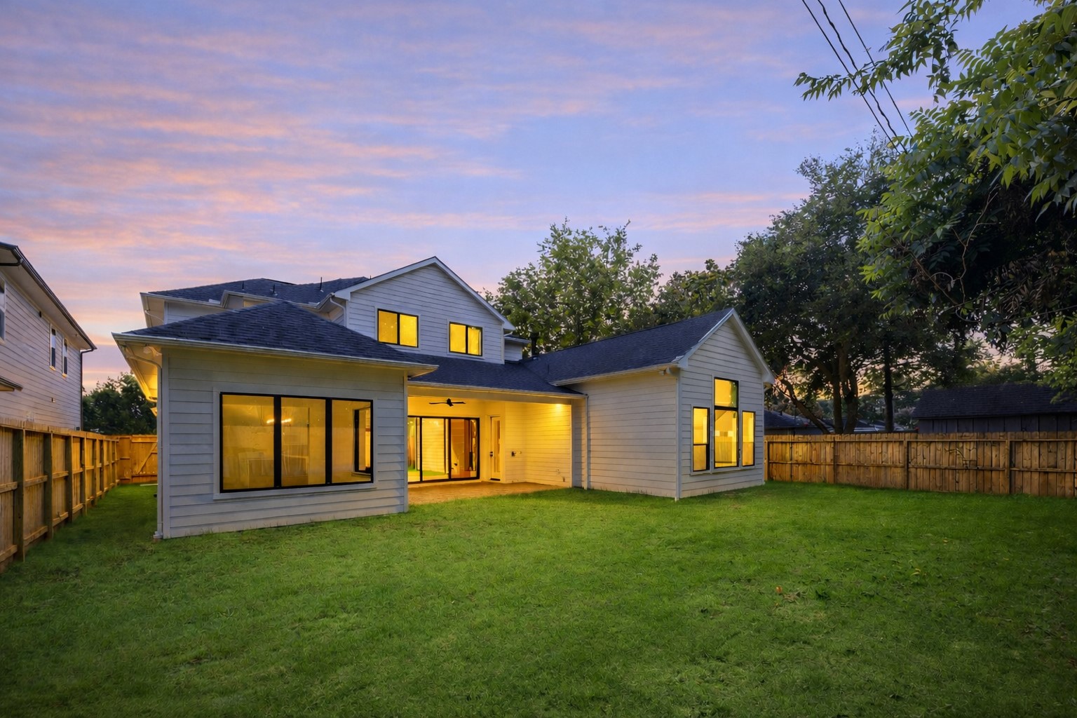 1201 Confederate Road Houston, TX 77055 - Photo 26 of 33 Expansive backyard with room to roam, flanked by privacy fencing and mature trees, perfect canvas for a pool, garden, or play space.