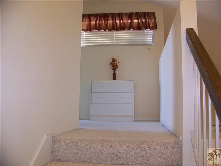 72400 Ridgecrest Lane Palm Desert, CA 92260 - Photo 18 of 25 a view of staircase with white walls