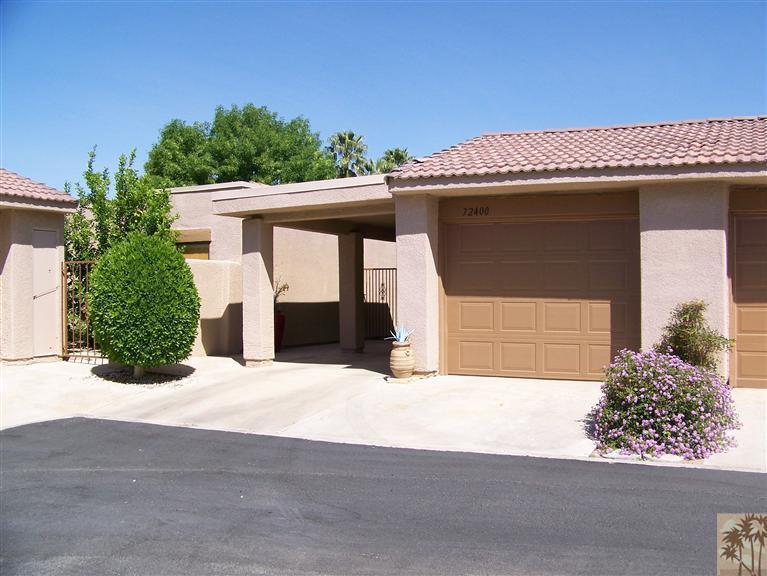 72400 Ridgecrest Lane Palm Desert, CA 92260 - Photo 2 of 25 a front view of a house with a garage
