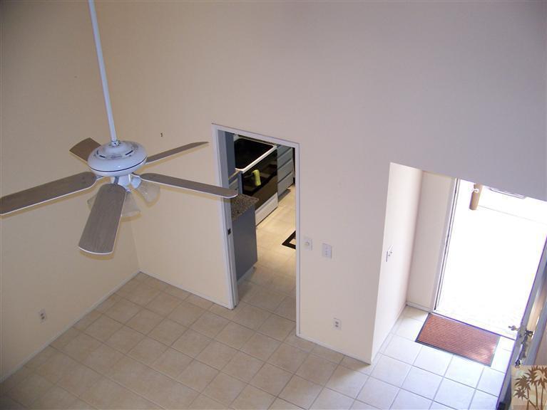72400 Ridgecrest Lane Palm Desert, CA 92260 - Photo 5 of 25 a view of entryway and kitchen