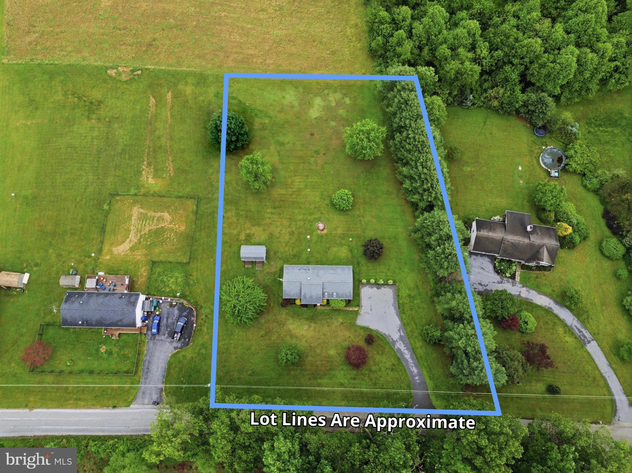491 Garvine Mill Road Fawn Grove, PA 17321 - Photo 36 of 47 an aerial view of residential houses with outdoor space and swimming pool