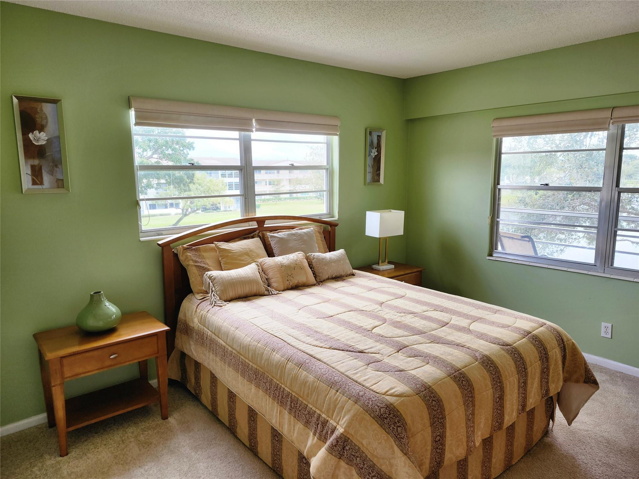 74 Preston Way Boca Raton, FL 33434 - Photo 12 of 28 a bedroom with a bed and window