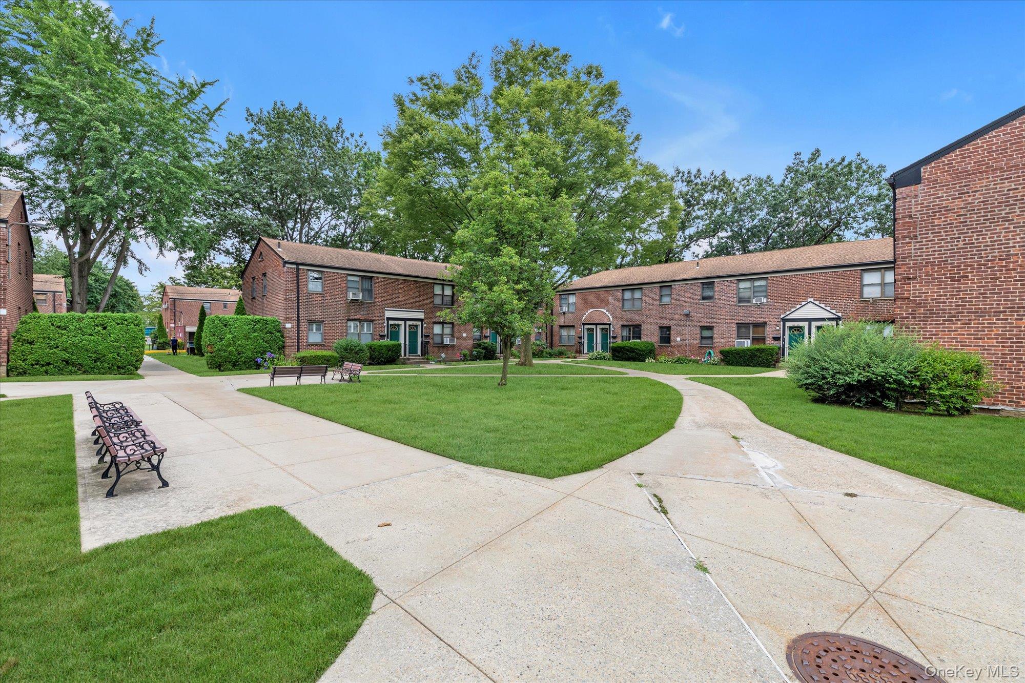 196-32 69th Avenue, Unit 1 Queens, NY 11365 - Photo 13 of 21 Surrounding community with a yard