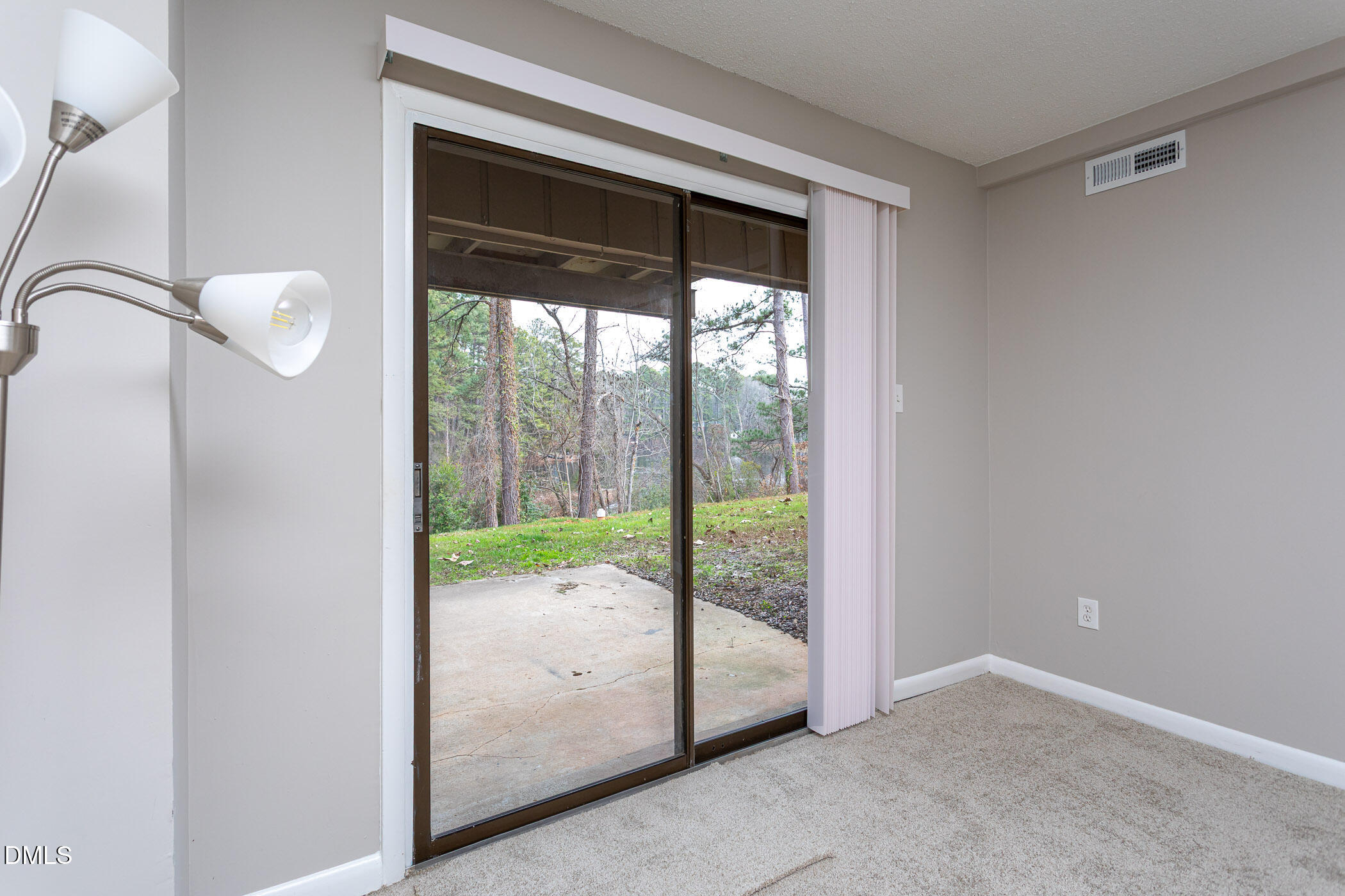 5118 Flint Ridge Place Raleigh, NC 27609 - Photo 11 of 18 To your covered Patio
