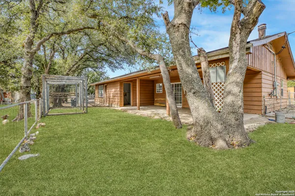 a backyard of a house with lots of green space