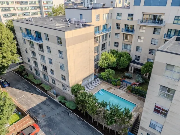 an aerial view of multi story residential apartment building