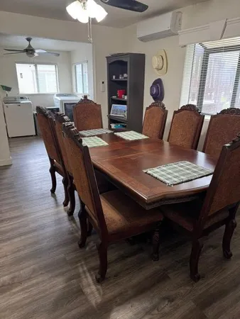 a view of a dining room with furniture