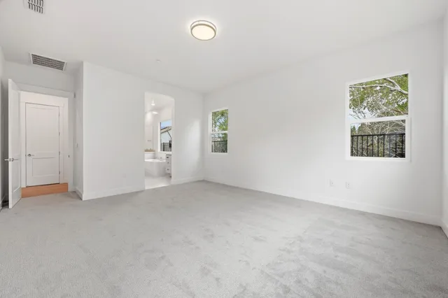 an empty room with windows