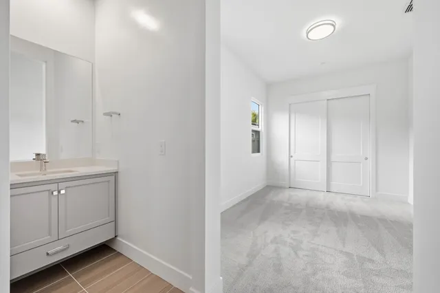 a view of a kitchen from the hallway