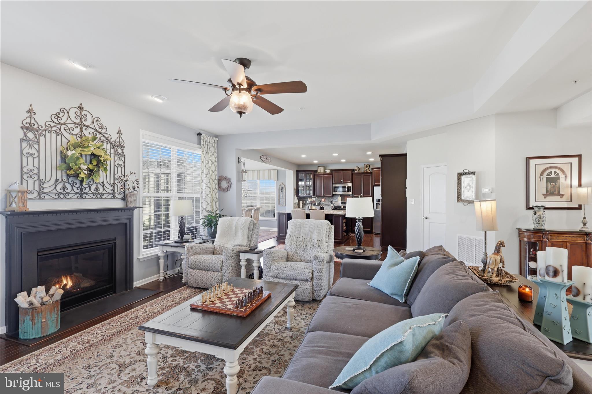 6606 Corbel Way Frederick, MD 21703 - Photo 13 of 60 a living room with furniture and a fireplace