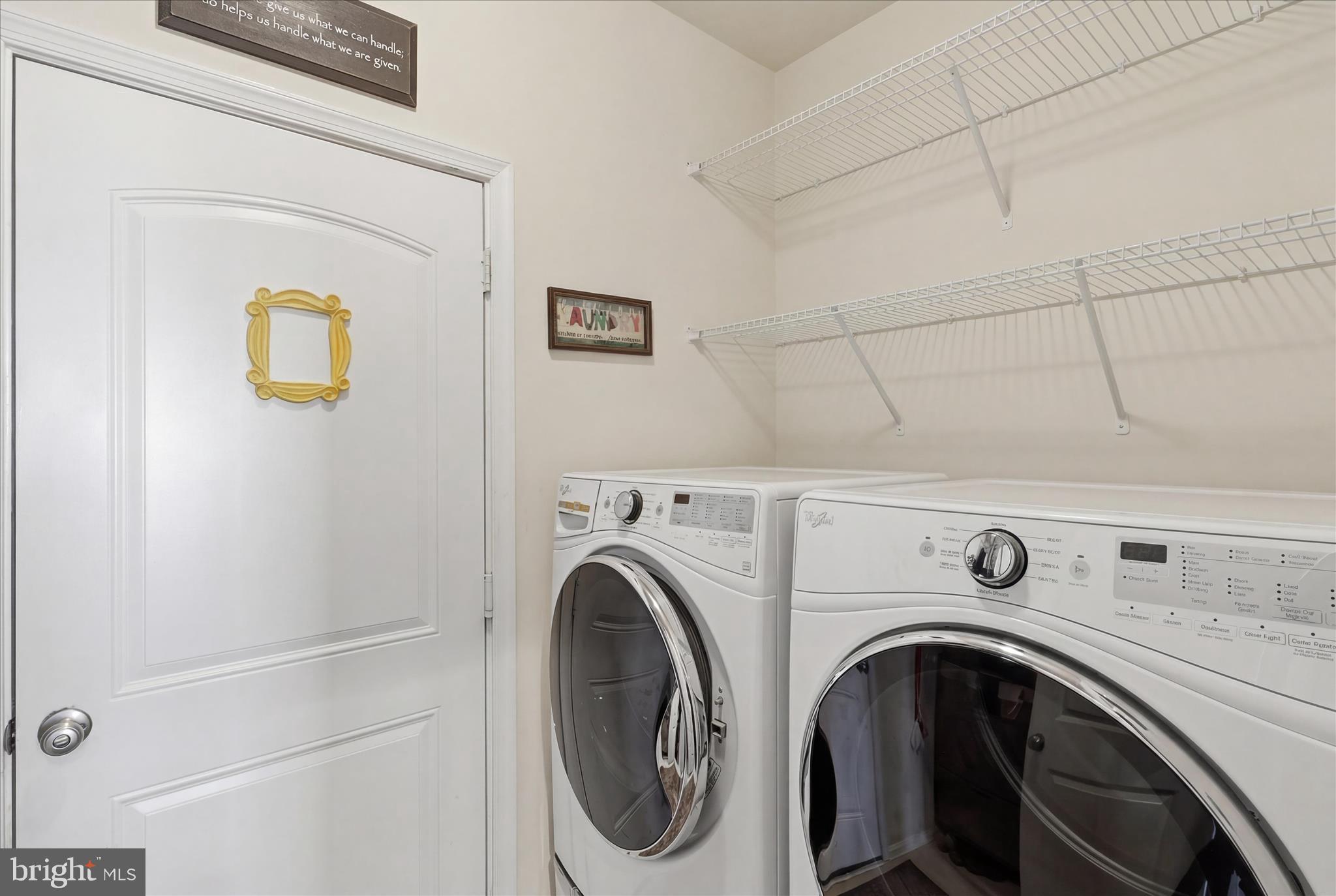 6606 Corbel Way Frederick, MD 21703 - Photo 23 of 60 a utility room with dryer and washer