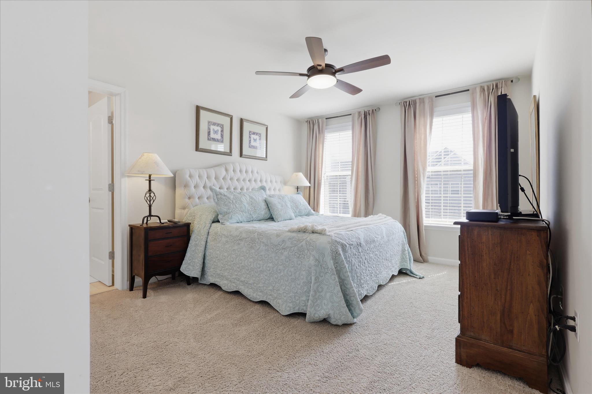 6606 Corbel Way Frederick, MD 21703 - Photo 31 of 60 a bedroom with a bed and a window