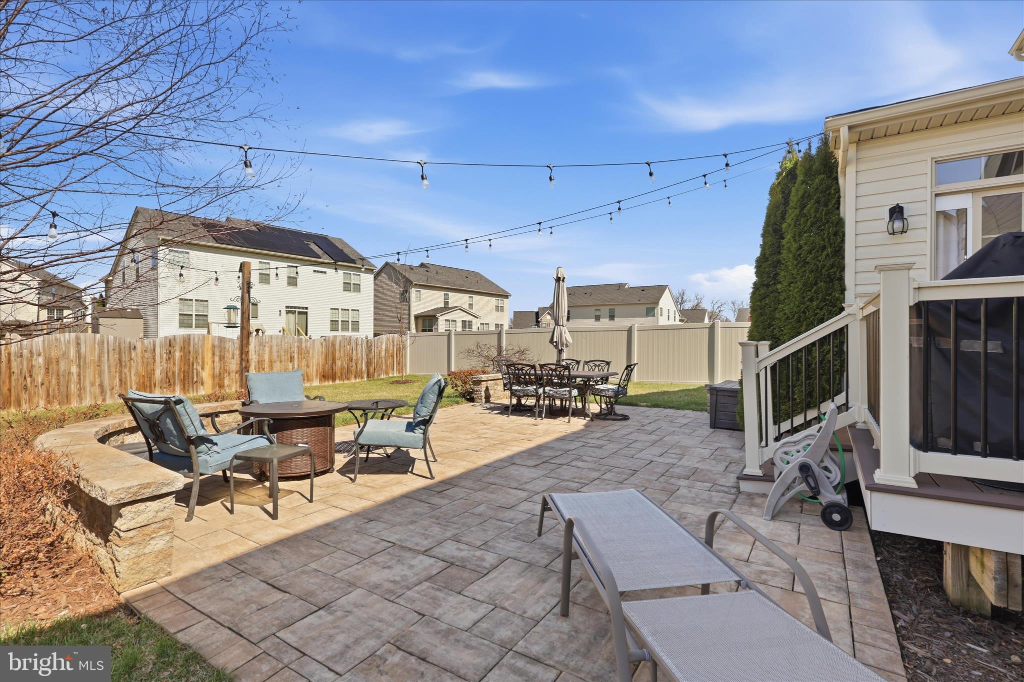 6606 Corbel Way Frederick, MD 21703 - Photo 50 of 60 a view of a patio with a table and chairs