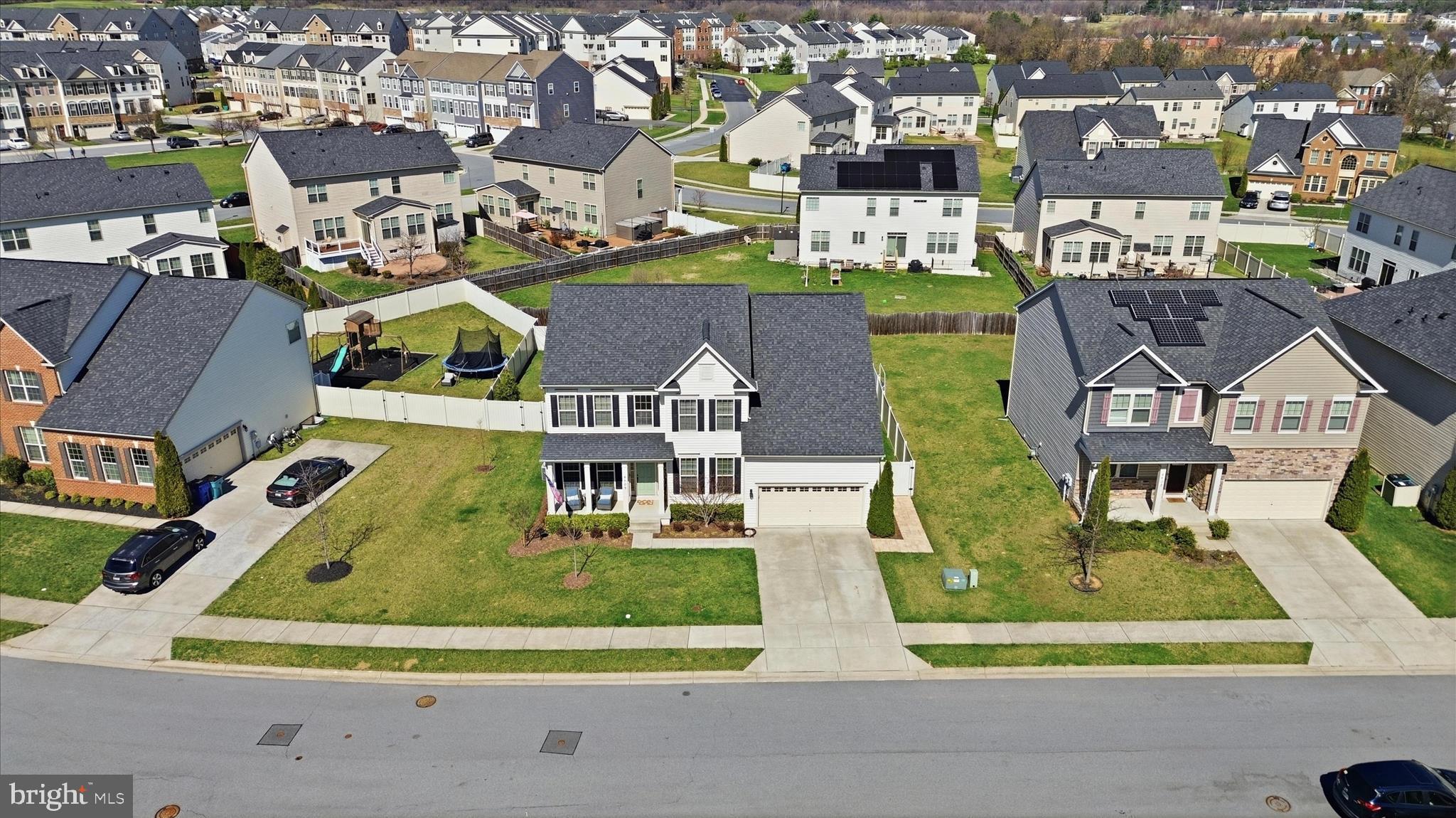 6606 Corbel Way Frederick, MD 21703 - Photo 53 of 60 an aerial view of residential houses with outdoor space and parking