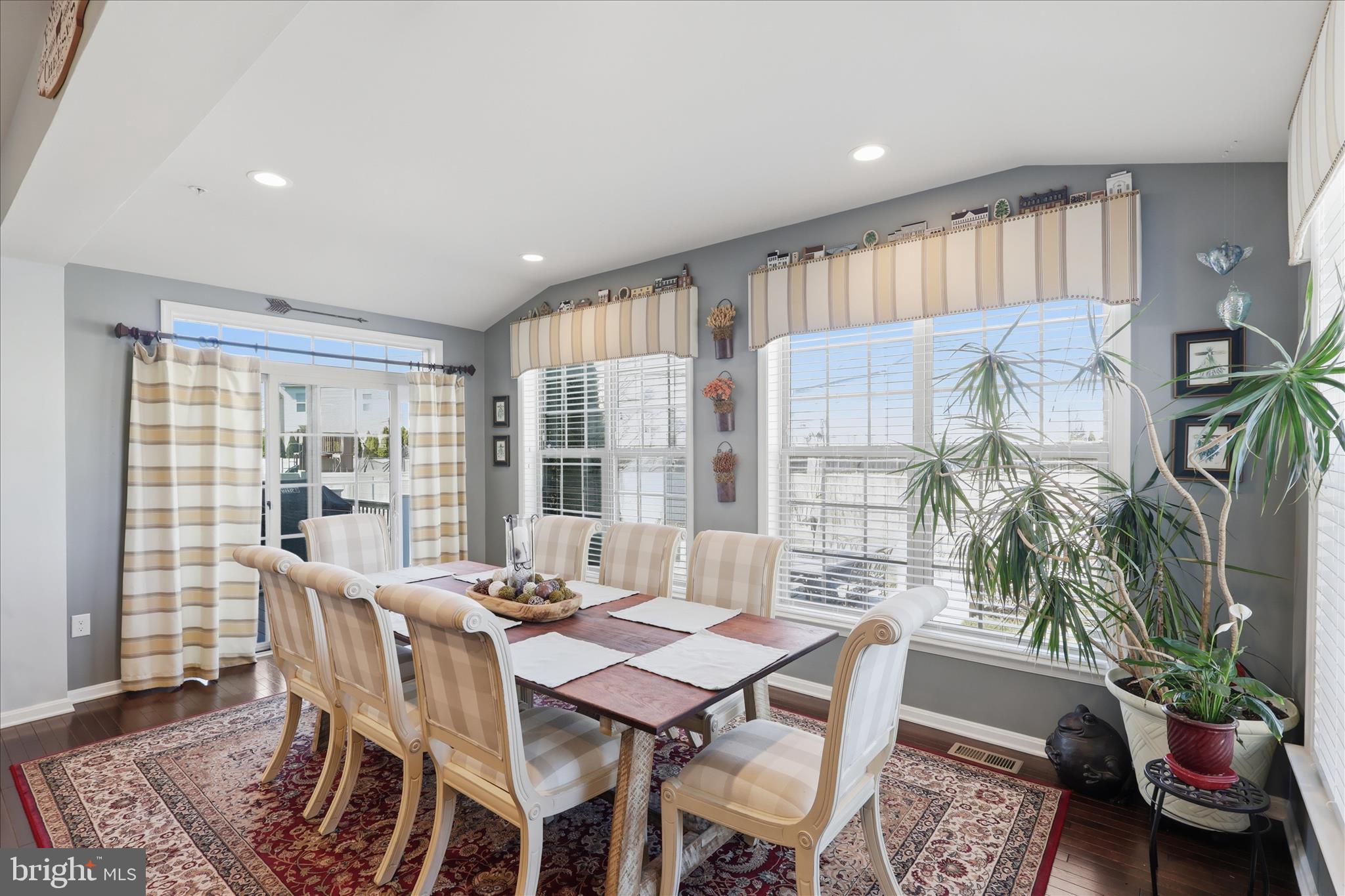 6606 Corbel Way Frederick, MD 21703 - Photo 8 of 60 a view of a dining room with furniture window and outside view
