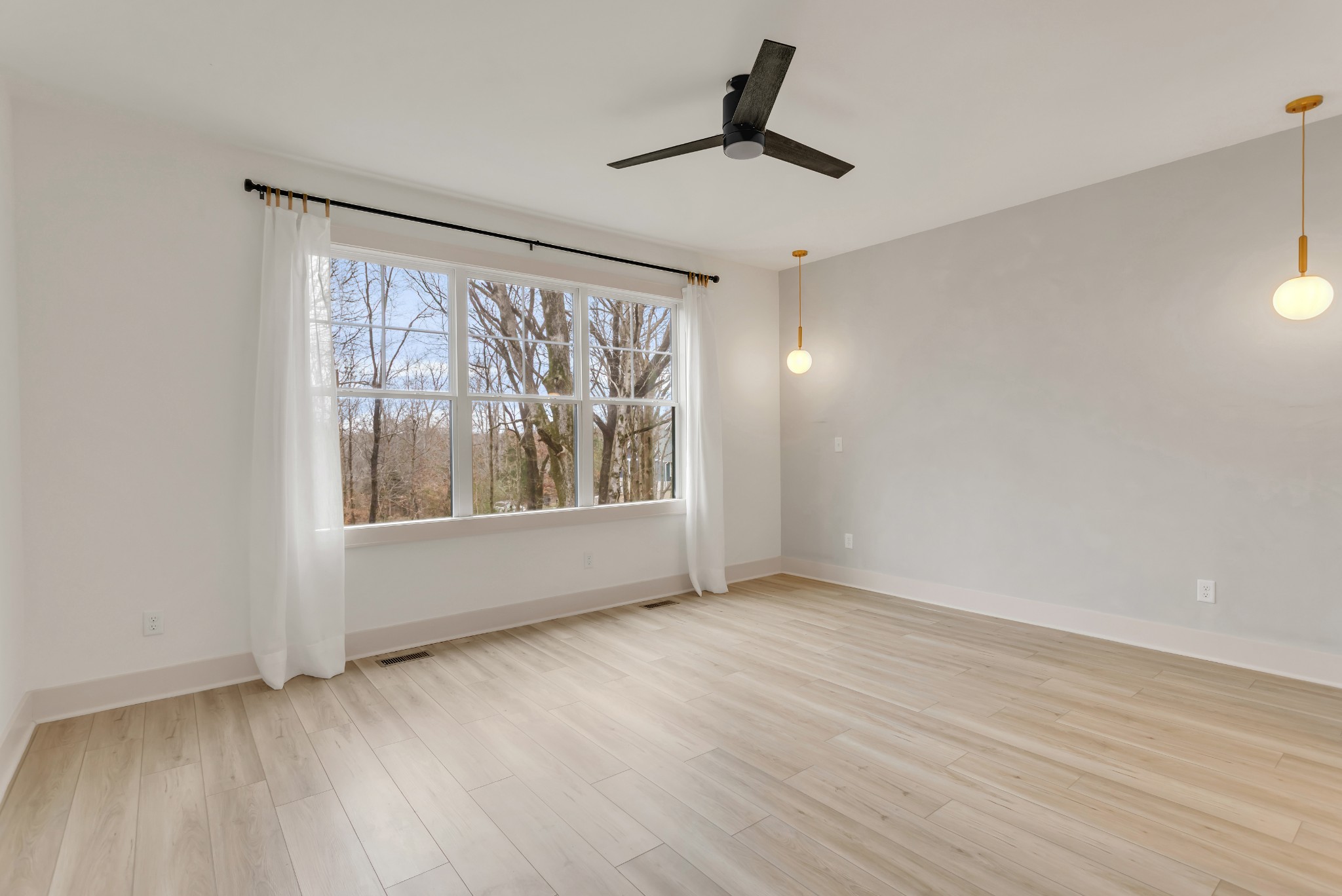 2140 Abiff Road Burns, TN 37029 - Photo 14 of 40 wooden floor in an empty room with a window