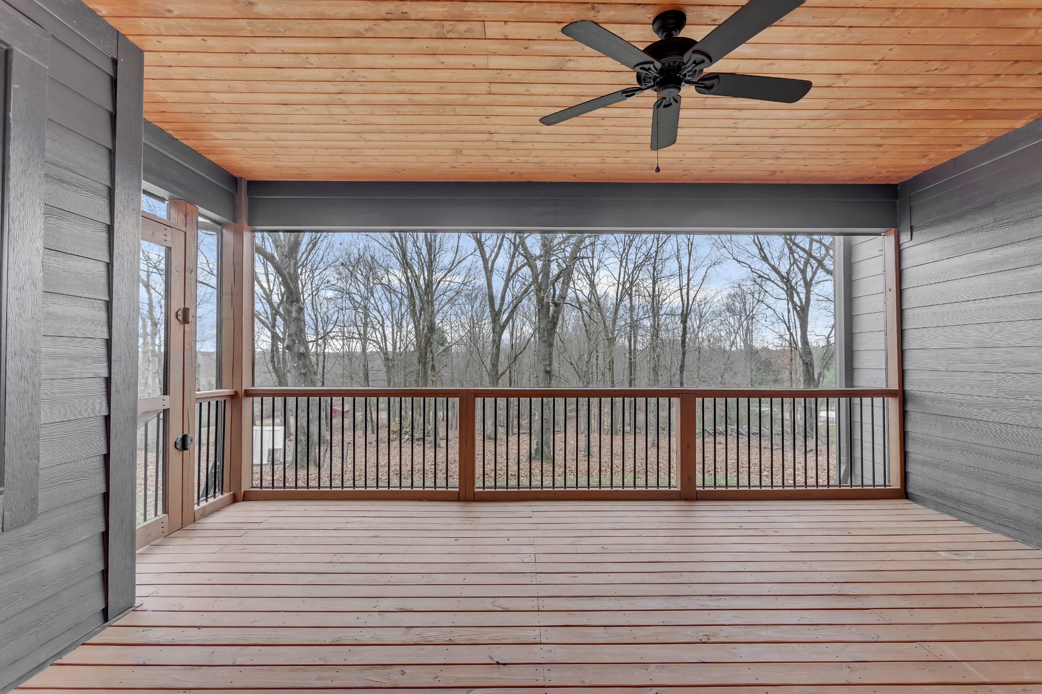 2140 Abiff Road Burns, TN 37029 - Photo 31 of 40 a view of a balcony with a ceiling fan