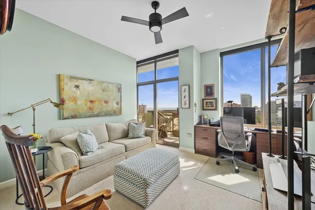 a living room with furniture and a window