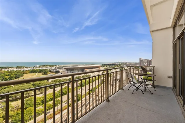 a view of a city skyline from a balcony