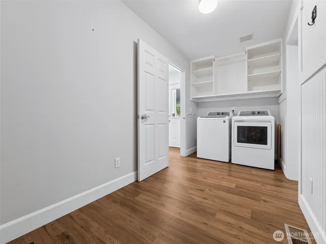 a view of empty room with air conditioner and window