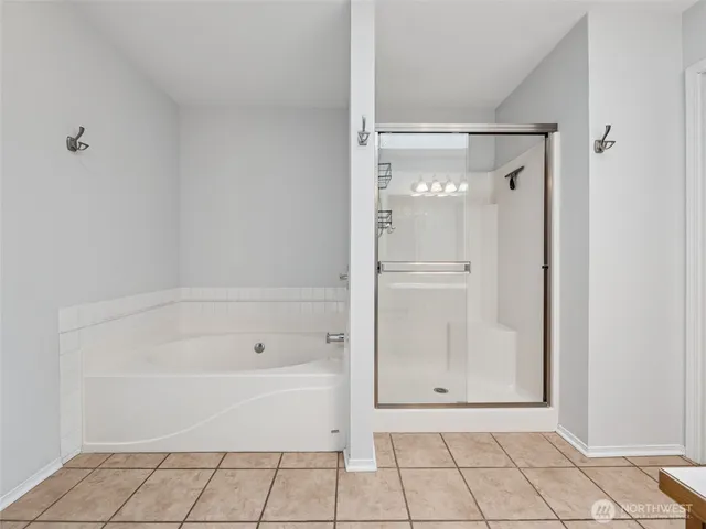 a bathroom with a sink a vanity and a mirror