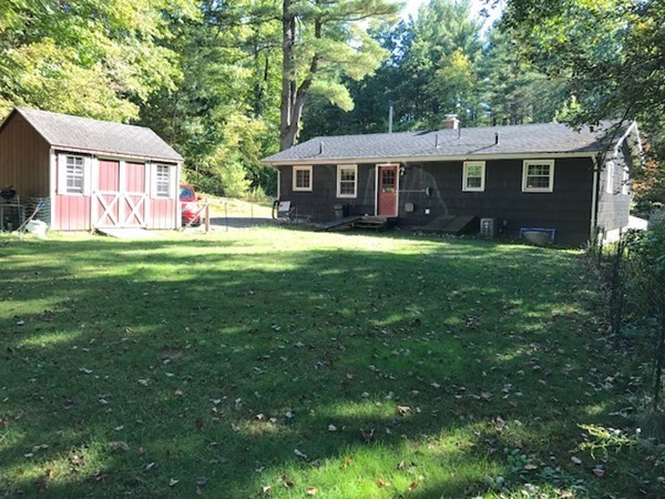 211 Westhampton Road Northampton, MA 01062 - Photo 21 of 21 a front view of a house with a garden