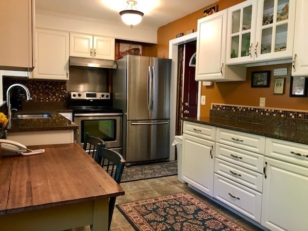 211 Westhampton Road Northampton, MA 01062 - Photo 5 of 21 a kitchen with stainless steel appliances granite countertop a refrigerator stove and sink